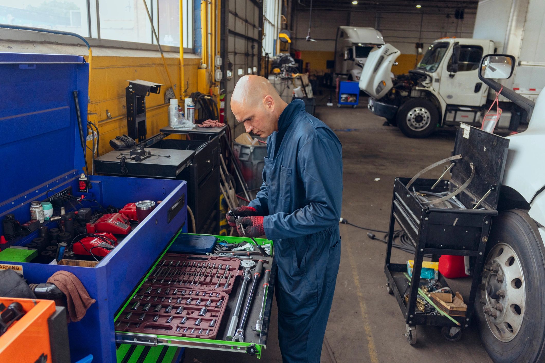 Automotive professional working in a garage workshop
