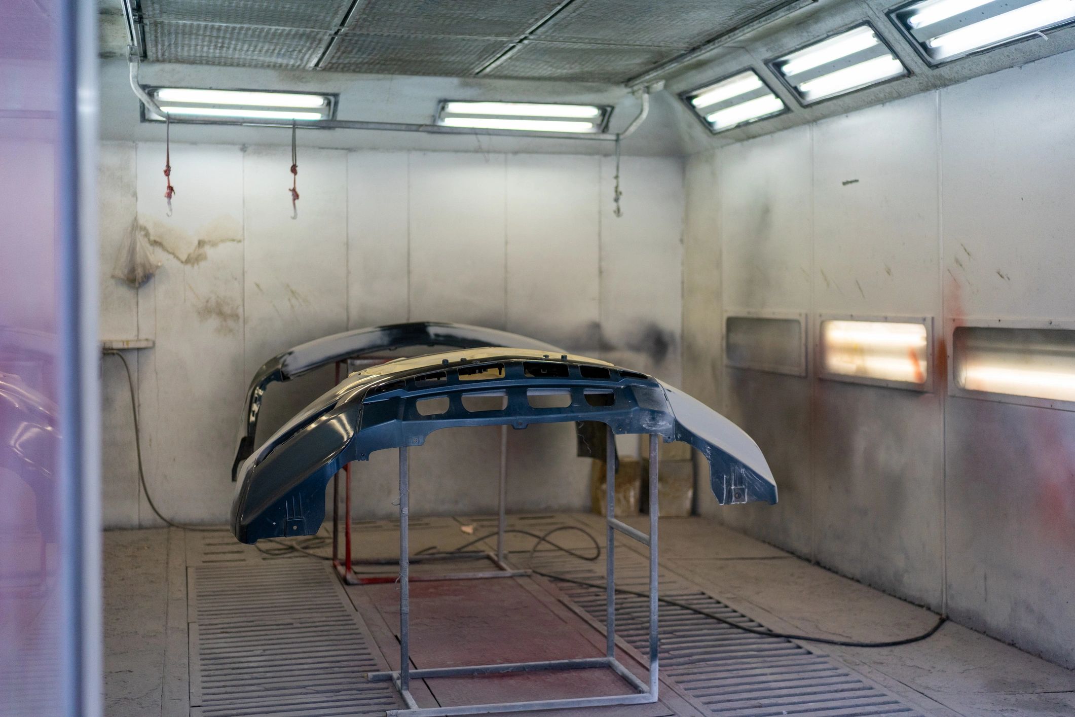 Automotive parts inside a paint booth